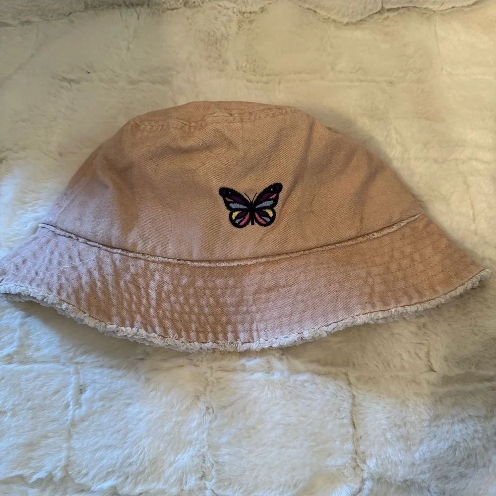 David and Young Khaki colored Bucket Hat. Has a Butterfly on the front New